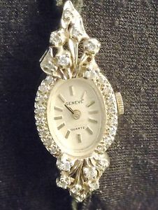 Ladies 14Kt Yellow Gold Geneve Watch w/ 1.00 ctw Diamond Bezel & Diamond Lugs