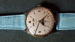 Classic vintage stainless  gold Uylsse Nardin triple date moonphase calender  wa