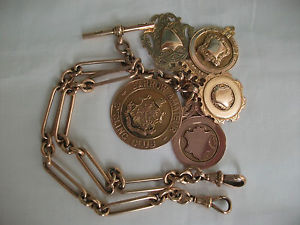 9CT SOLID ROSE GOLD, DOUBLE ALBERT  WATCH CHAIN 1897 + FIVE FOBS , 60.4 GRAMS