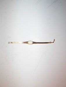 14k gold and diamond watch