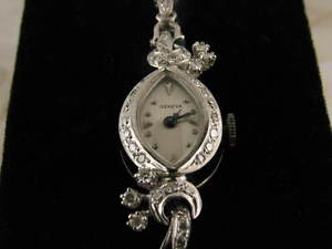 14kt Gold Geneva Woman's Watch w/ 42 Diamonds of 1.38ct.