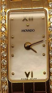 WOMEN MOVADO WATCH SOLID 14K GOLD AUTHENTIC MOTHER OF PEARL 30 DIAMONDS BEZEL