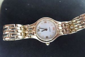 MOVADO LADIES 14K SOLID GOLD WATCH WITH SOLID 14K GOLD BAND VERY NICE HIGH END