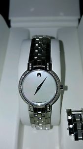 Movado ladies watch. Faceto  with diamonds,  mother of pearl face