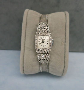 Montre ancienne en or et diamants