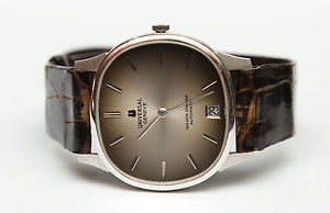 RARE ORIGINAL UNIVERSAL GENEVE GOLDEN SHADOW AUTOMATIC 25J SWISS VINTAGE WATCH