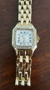 Ladies 14K gold ,Geneve Swiss diamond bezel panther watch