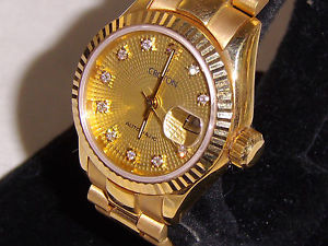 CROTON SOLID 18K LADIES W/DIAMONDS OVER APROX. 55 GRAMS MOST ALL 18K GOLD
