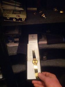 gold watch 14 karat solid and  rare