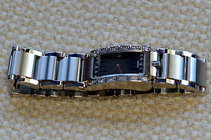 Movado Elliptica ladies with 12  Diamonds black dial silver hands 84 h5 1431