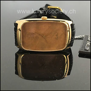 Rolex Cellini in oro giallo e radica