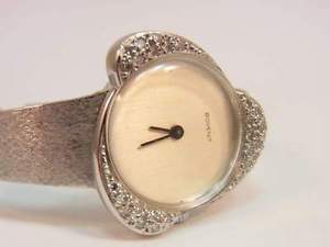 DAMEN ARMBANDUHR GOLD 585 MIT 0,50ct DIAMANTEN MARKE BOVENIT GEWICHT 30,80g