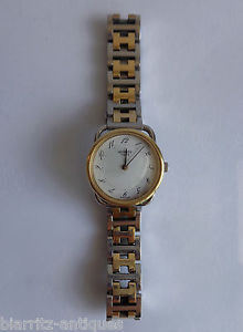 HERMES PARIS - GOLD AND STEEL LADY WATCH - 'ARCEAU' MODEL - QUARTZ MOVEMENT -