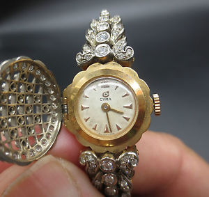 Lady watch brand CYMA in gold and diamonds