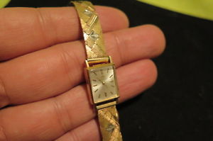 MOVADO 18K SOLID GOLD WOMEN WATCH WITH A STUNNING GOLDEN BRACELET; LOOK++++