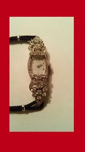 LADY'S 14K WHITE GOLD HAMILTON DIAMOND HINGED LUG WRISTWATCH