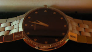 Movado mens watch diamonds face to