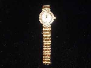 300 14k Y G diamond quarts watch mother of pearl face 28 dwt 1.5 TCW E VS1 6.25