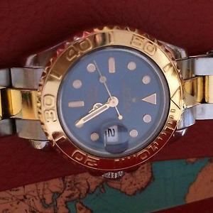 Rolex Oyster perpetual Datejust en oro y acero con esfera azul.