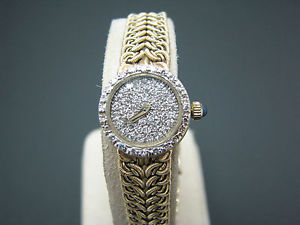 Vintage Cyma 14k Yellow Gold Women's Watch Encrusted with Diamonds