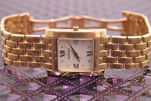 Movado unisex 585 Watch White dial Water Resistant Sapphire Crystal 14K Gold