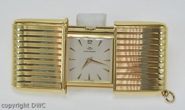 Reiseuhr Gold Uhr in 750 Gold Handaufzug Marke Movado Herrenuhr Marken Uhren