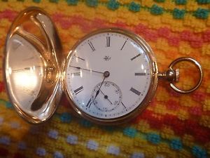 Solid 14  karat gold hunter cased elgin dexter st. pocket watch