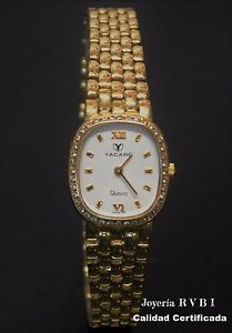 Reloj ORO amarillo de 18kts con DIAMANTES. Maquinaria SUIZA marca YACARÉ.
