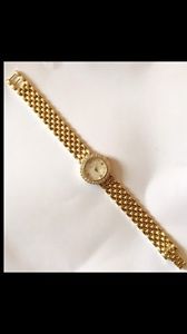 14 Kt Gold Geneve Watch With Diamonds Bezel And Pearl Face