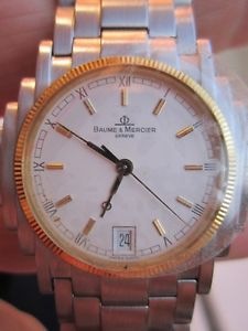 Baume and Mercier Women's Shogun steel and gold!! serial number 136.018.3