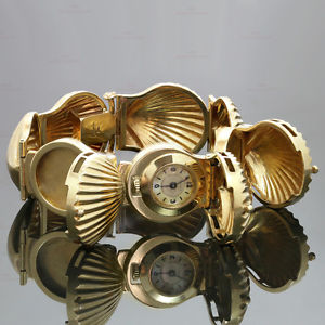 J. SCHULZ Diamond Ruby 14k Yellow Gold Seashell Bracelet Locket Watch Circa 1925
