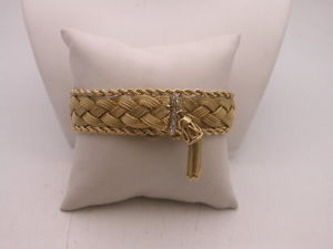 VINTAGE PEIKIN 14K GOLD DIAMOND TASSLE LADIES WATCH 54 GRAMS