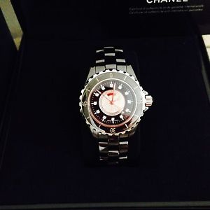 Chanel J12 watch. Black model 2122 . BRAND NEW. 33mm Diamond dial. STUNNING!