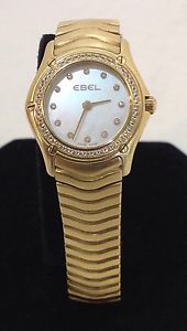 ladies Ebel Classic Wave Wristwatch. diamonds & 18kt. yg. small wrist size