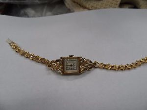 ladies vintage solid 14kt gold 17j wind mvt watch w/ diamond band & case working