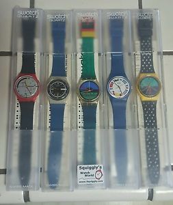 Lot of 80 swatch watches, gents and lady's, display cases, 80's, some rare