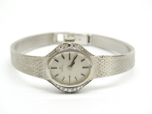 Gold 750 Original Ebel Damen Armbanduhr mit 14 Diamanten - Guter Zustand